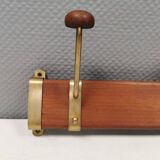 Danish teak and brass coat rack with adjustable hooks, 1960s.