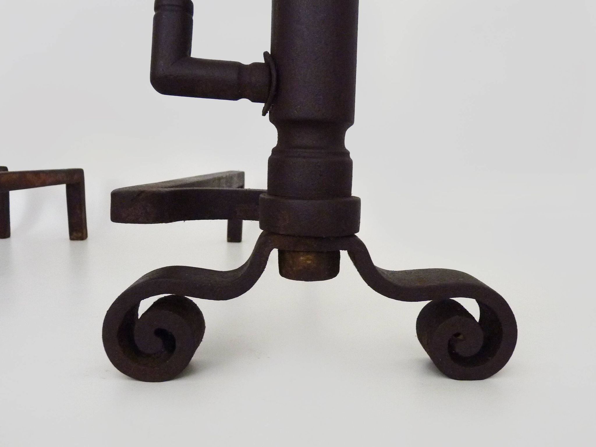 Large pair of wrought iron fireplace andirons. France, 19th century.