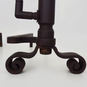 Large pair of wrought iron fireplace andirons. France, 19th century.