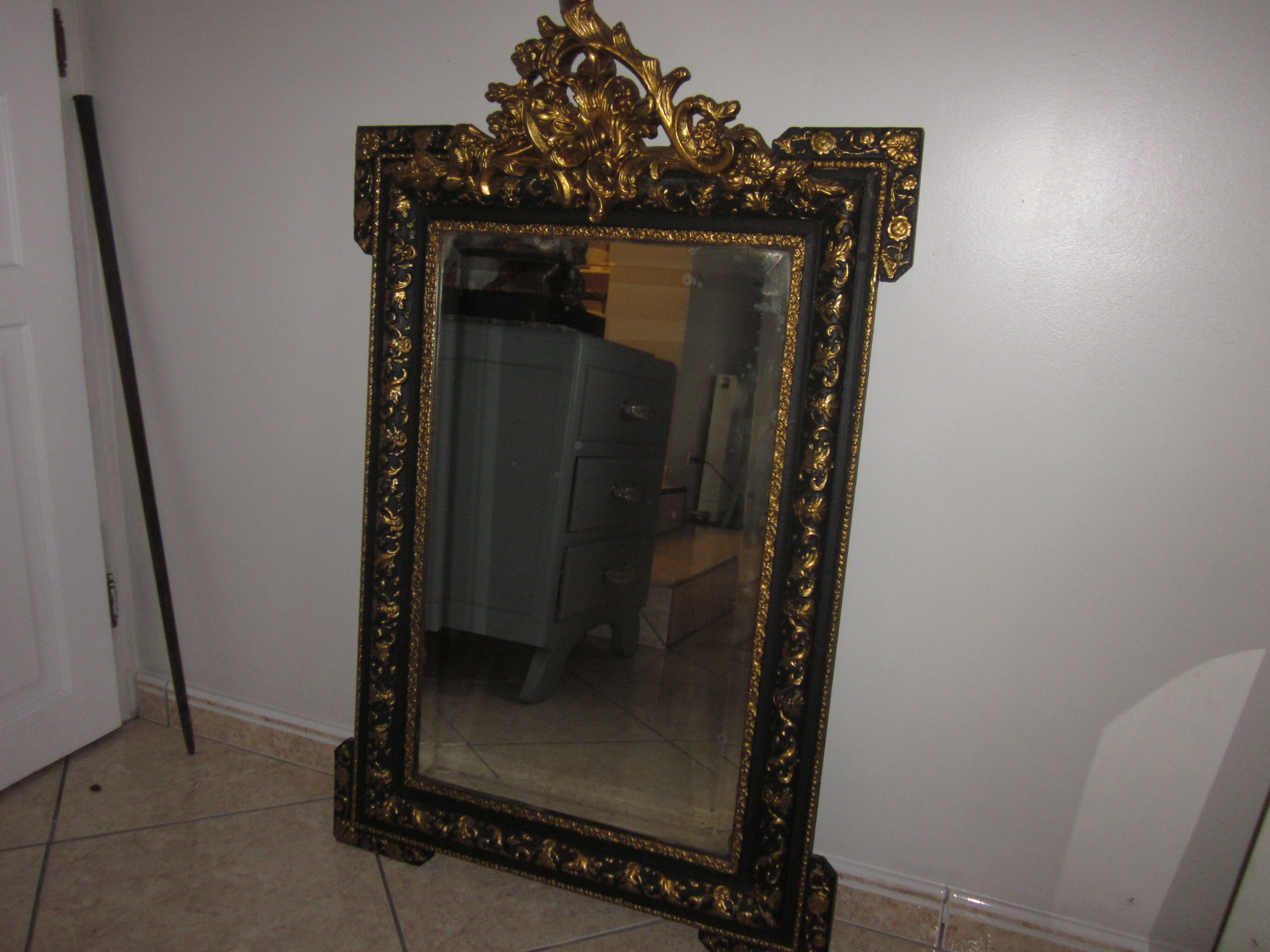 Old mirror with pediment