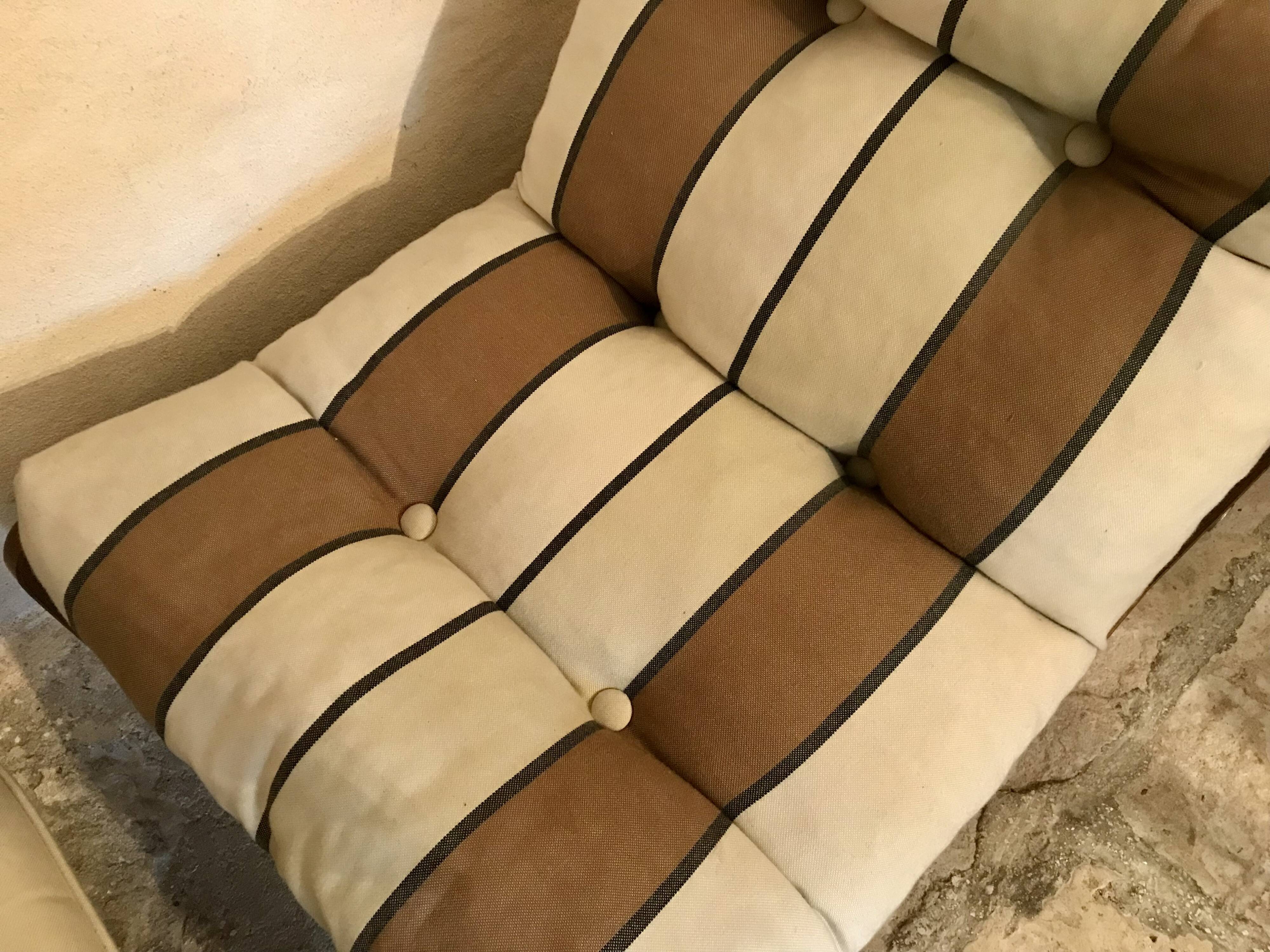 Vintage fireside chair and pouf circa 1980