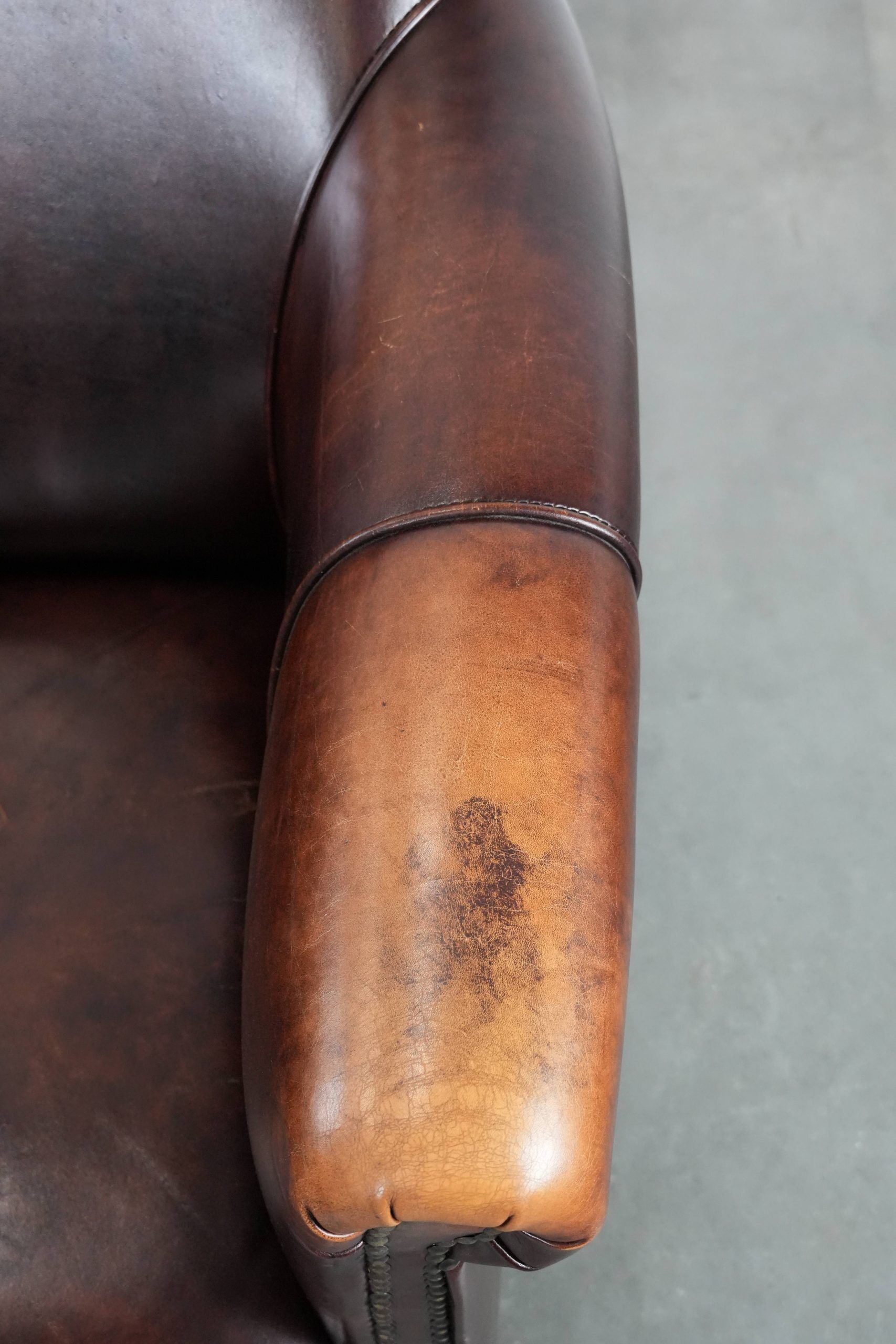 Characterful and comfortable cowhide leather armchair