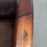 Characterful and comfortable cowhide leather armchair