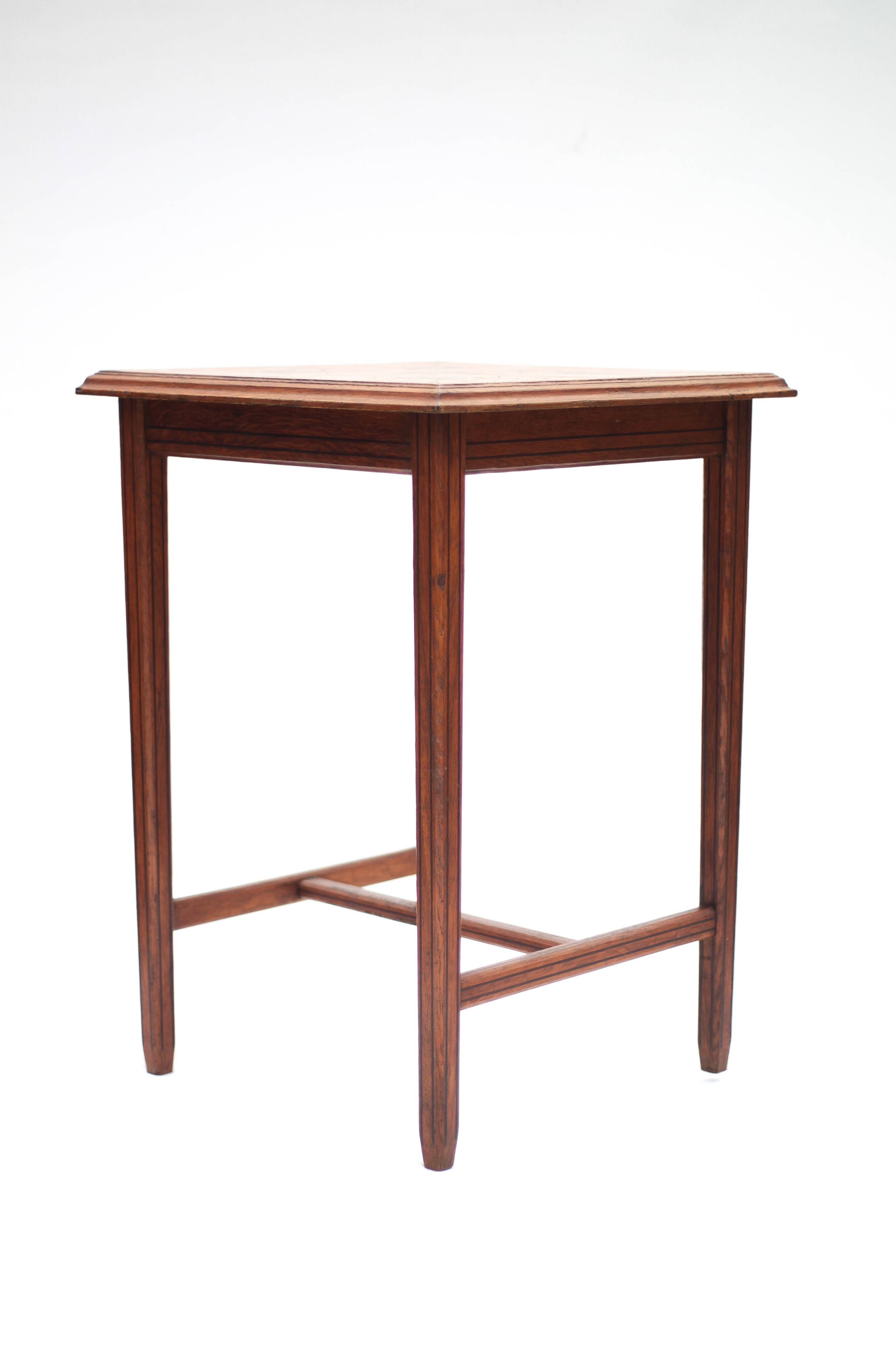 Wood table with marquetry, table with an antique parquet top, antique table.