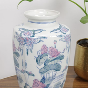 Vintage porcelain vase with pink flowers