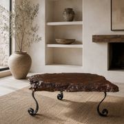 Brutalist coffee table in solid elm and wrought iron, ram's horn legs.