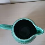 Vintage earthenware pitcher.