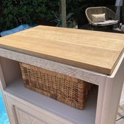 Beautiful art deco jam cupboard in delicate beige tone / and wicker basket