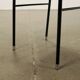 Vintage chairs from the 1960s in enamelled metal, faux leather and foam.