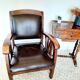 Colonial style wooden armchair