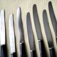 Box of 12 vintage table knives in stainless steel and brown bakelite