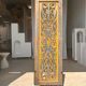 Rectangular Indonesian construction element with blue and yellow plant in carved wood
