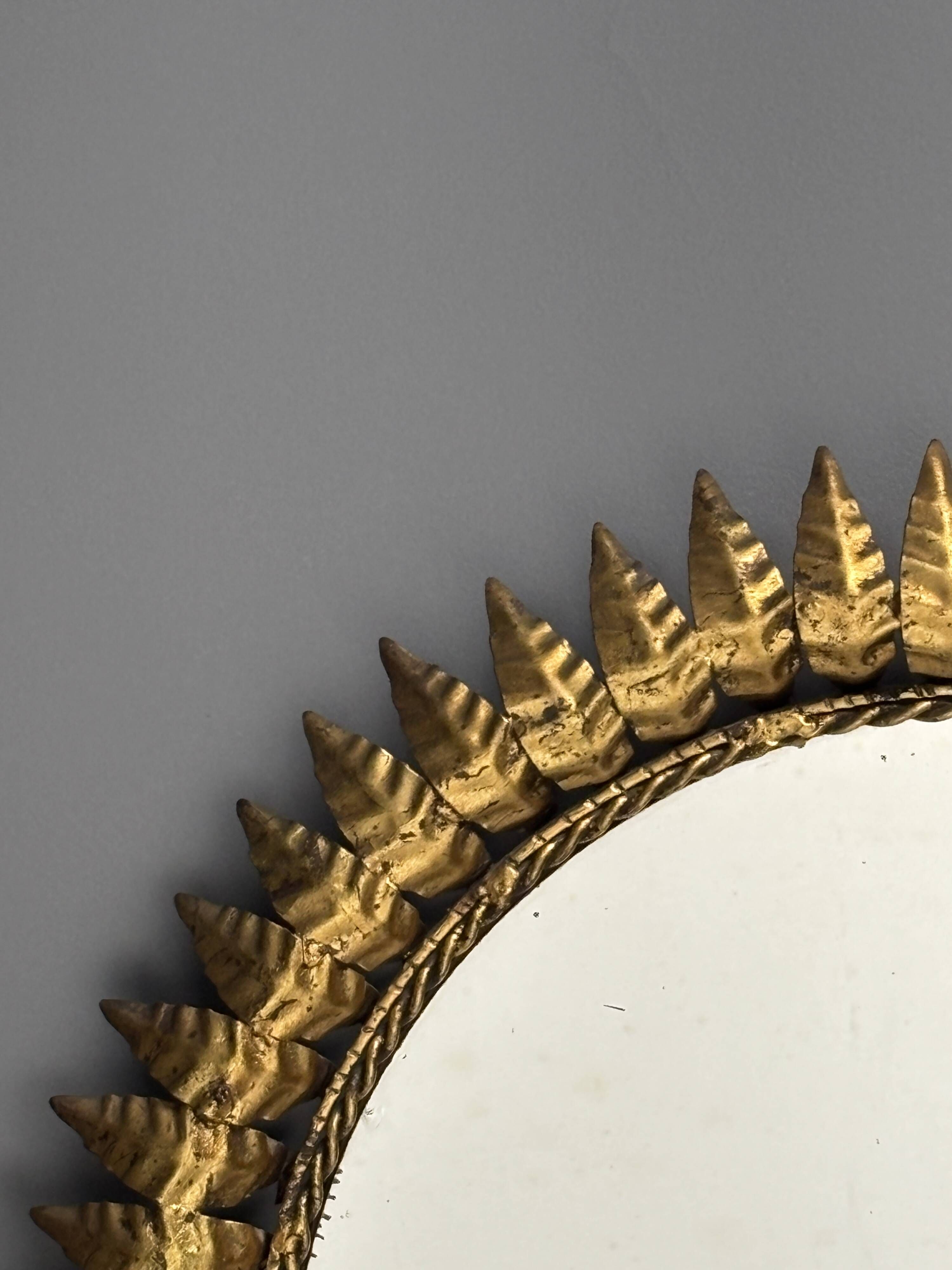Midcentury bohemian Hollywood Regency Spanish gilt metal sun mirror, 1960s