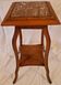 Antique Art Nouveau pedestal table with carved wood and marble top.