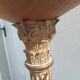 Large antique church candlestick in carved wood transformed into a lamp.