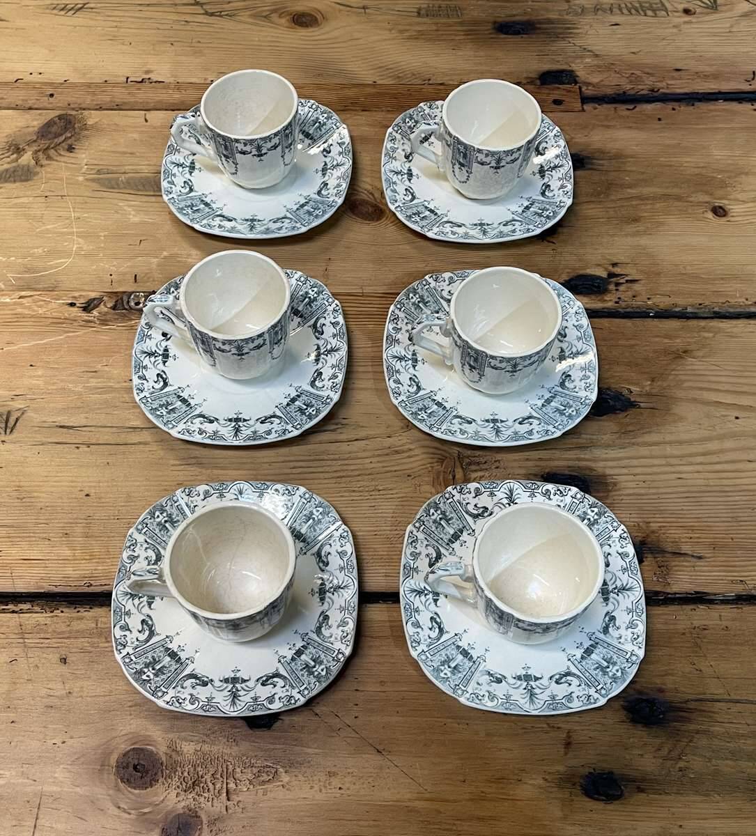 6 cups and saucers in Gien earthenware with Mascaron decoration from the early 20th century.