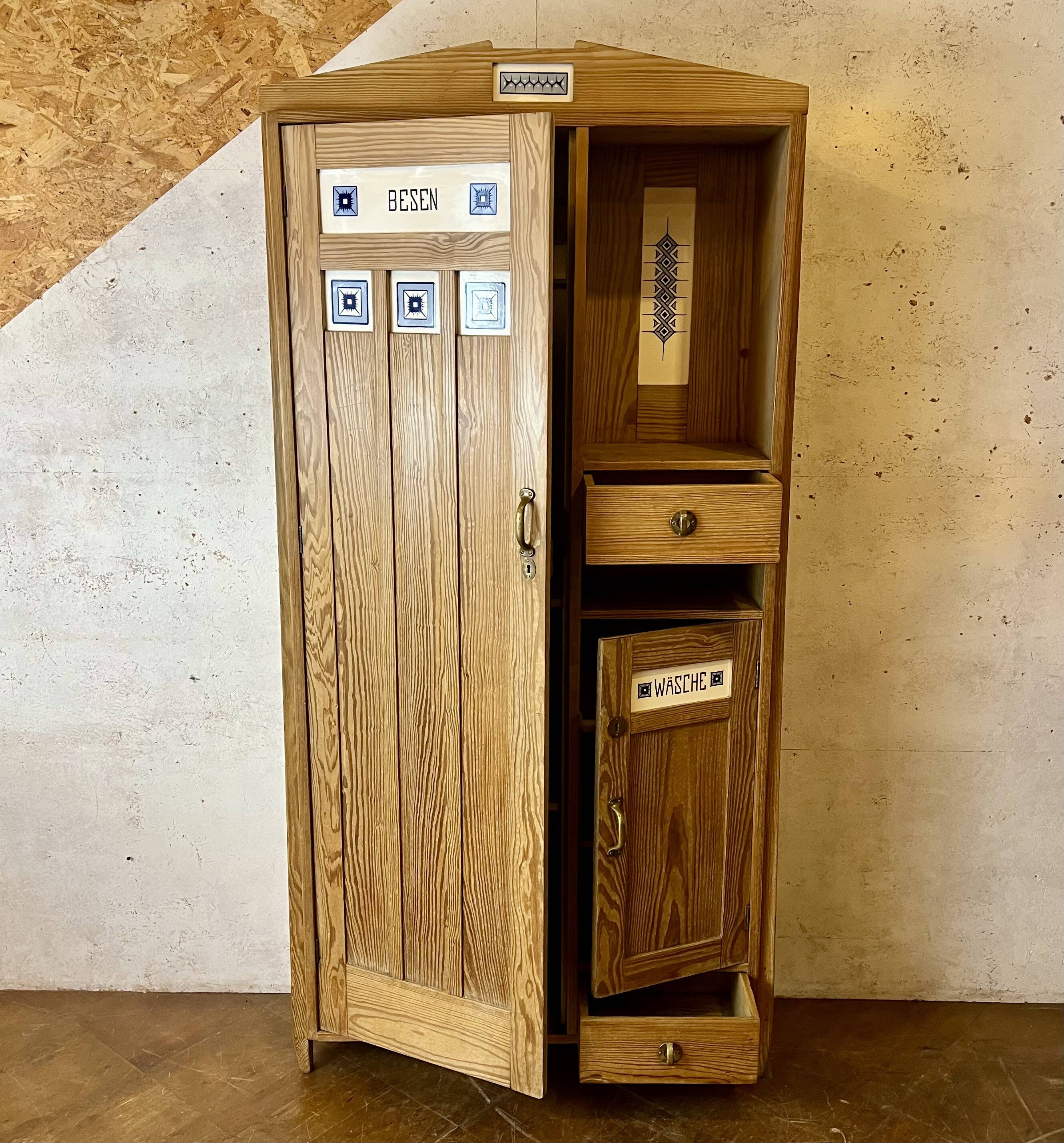 Art Nouveau wardrobe in pine with ceramic tiles, early 20th century.