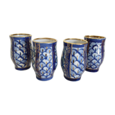 Series of 4 porcelain vases
