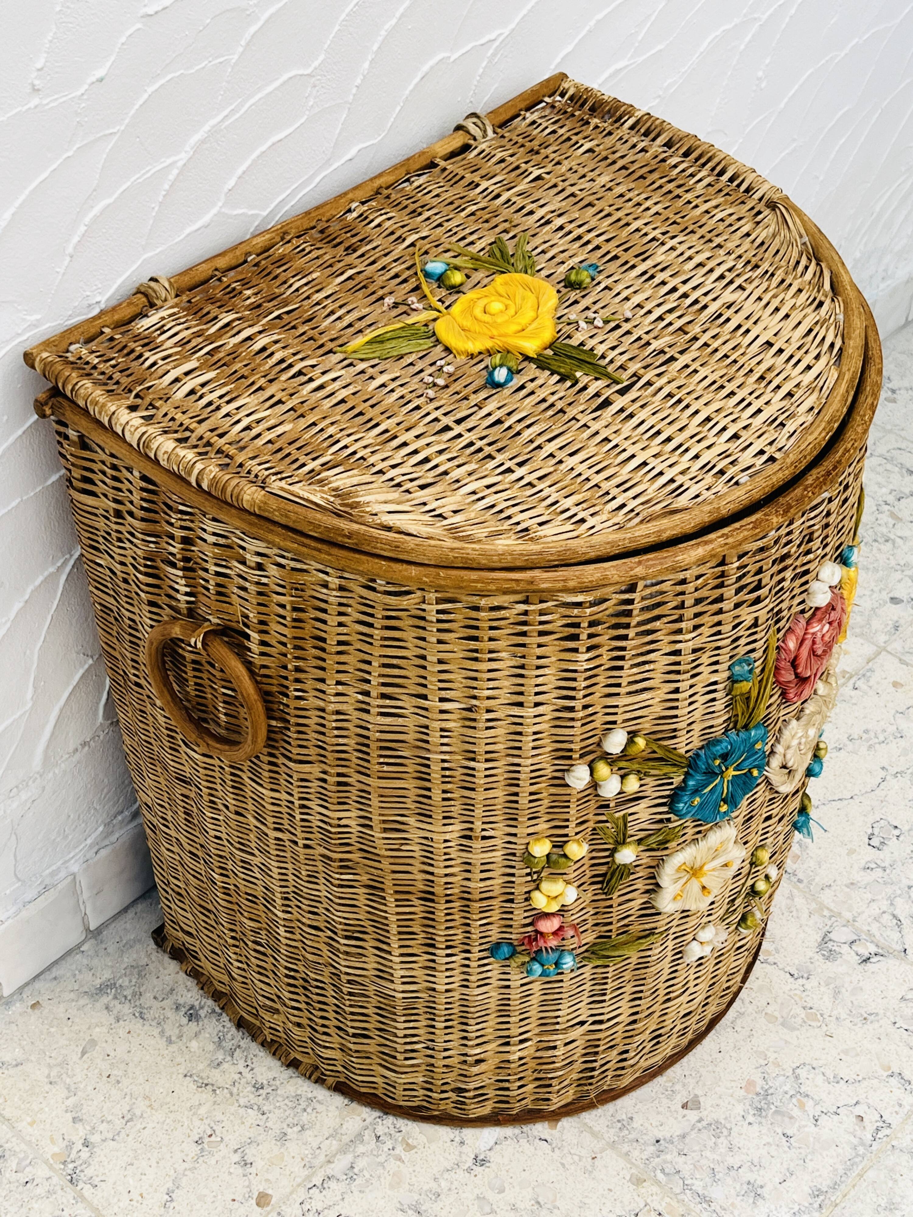 Vintage wicker mannequin with colourful floral decoration.