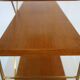 String wall shelf in gold metal and wood from the 60s