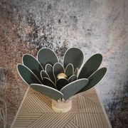 Flower table lamp made of rattan and fir green linen petals