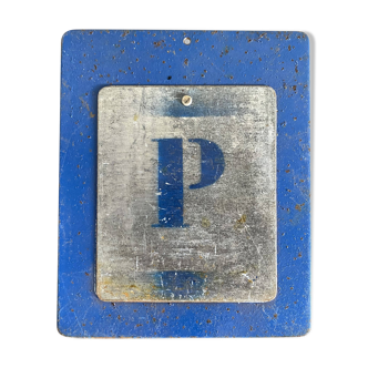 Letter P on metal plates