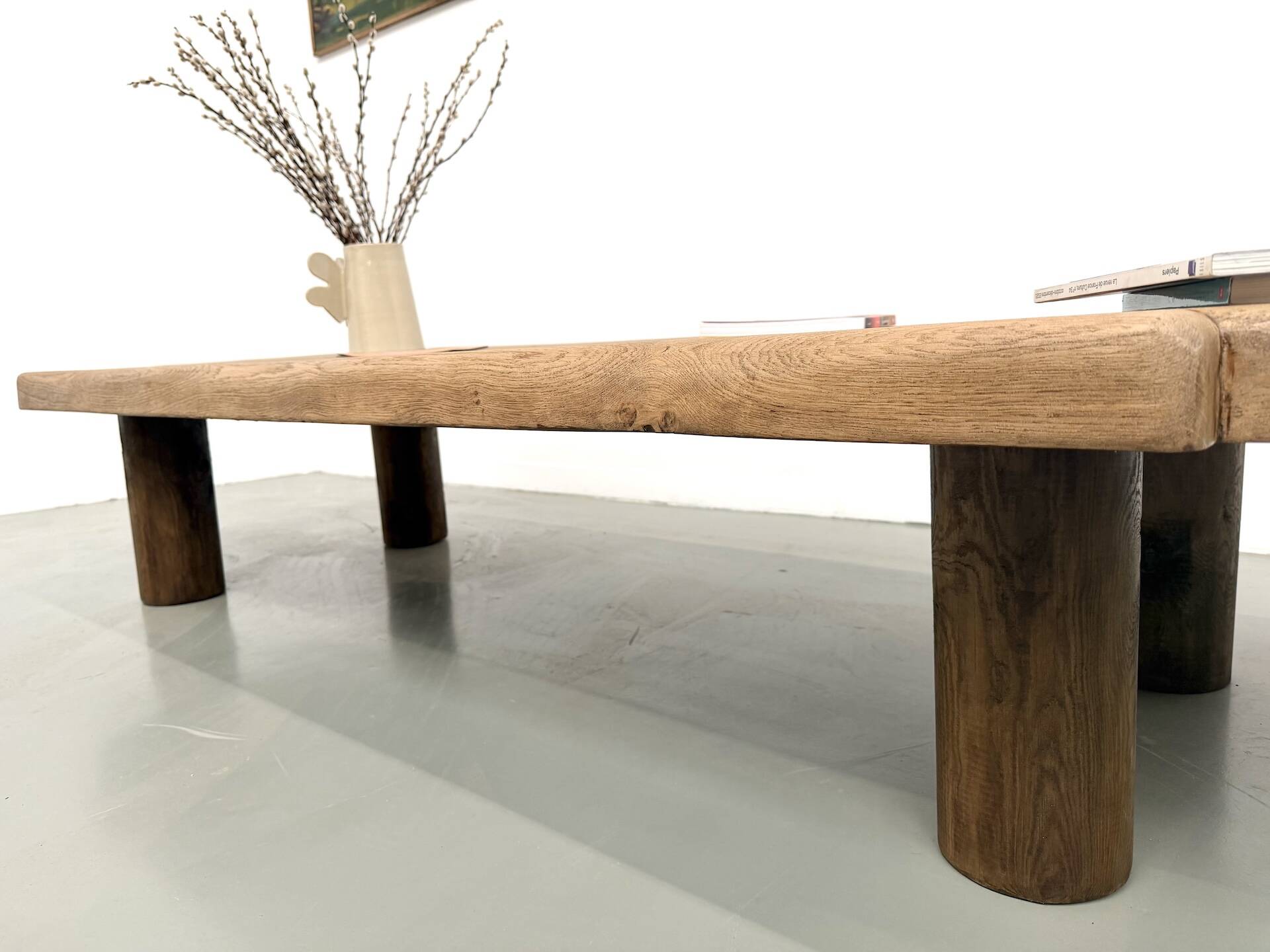 XXL oval coffee table in solid oak, cylindrical base, 1950s.