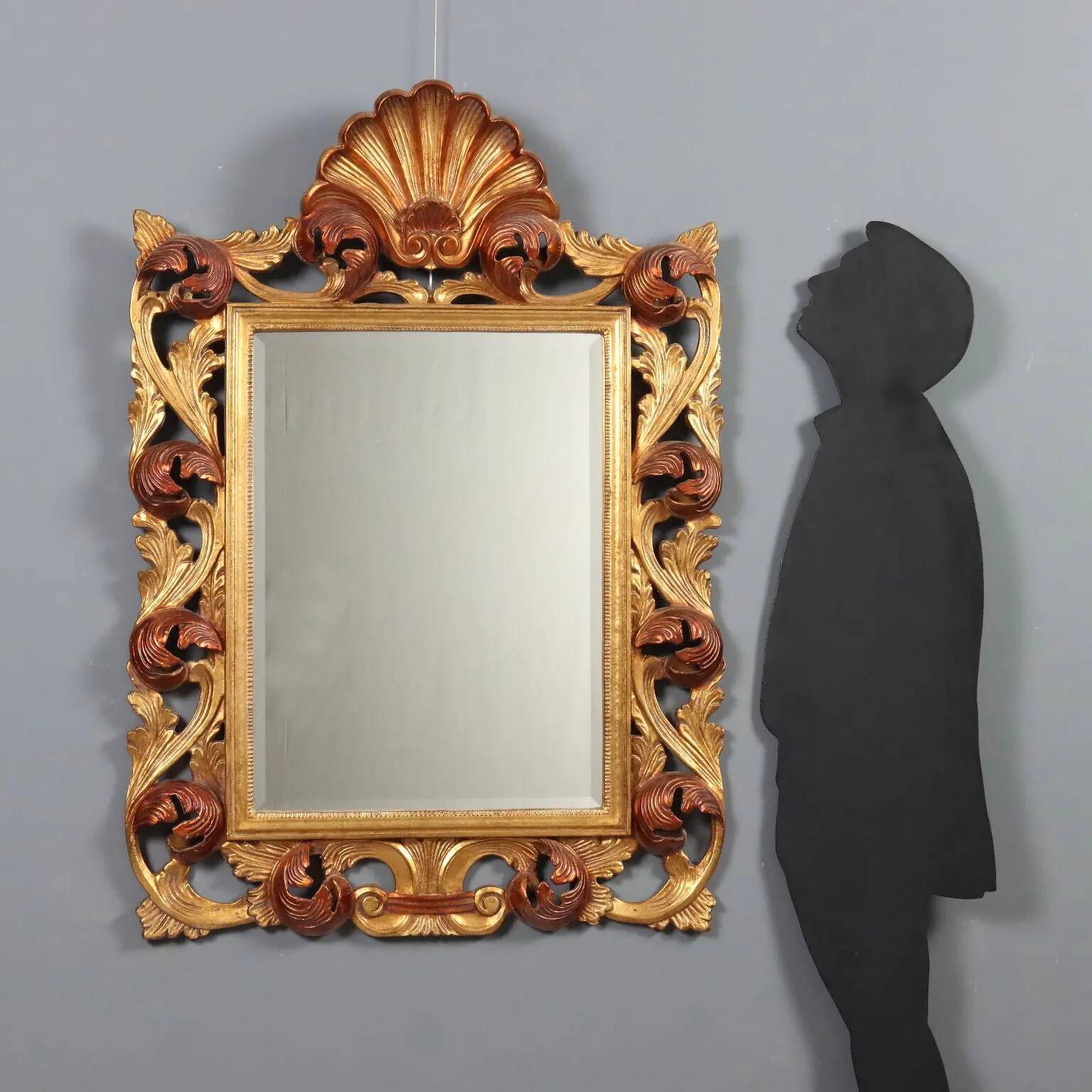 Antique baroque style mirror in carved wood, Italy, 20th century.
