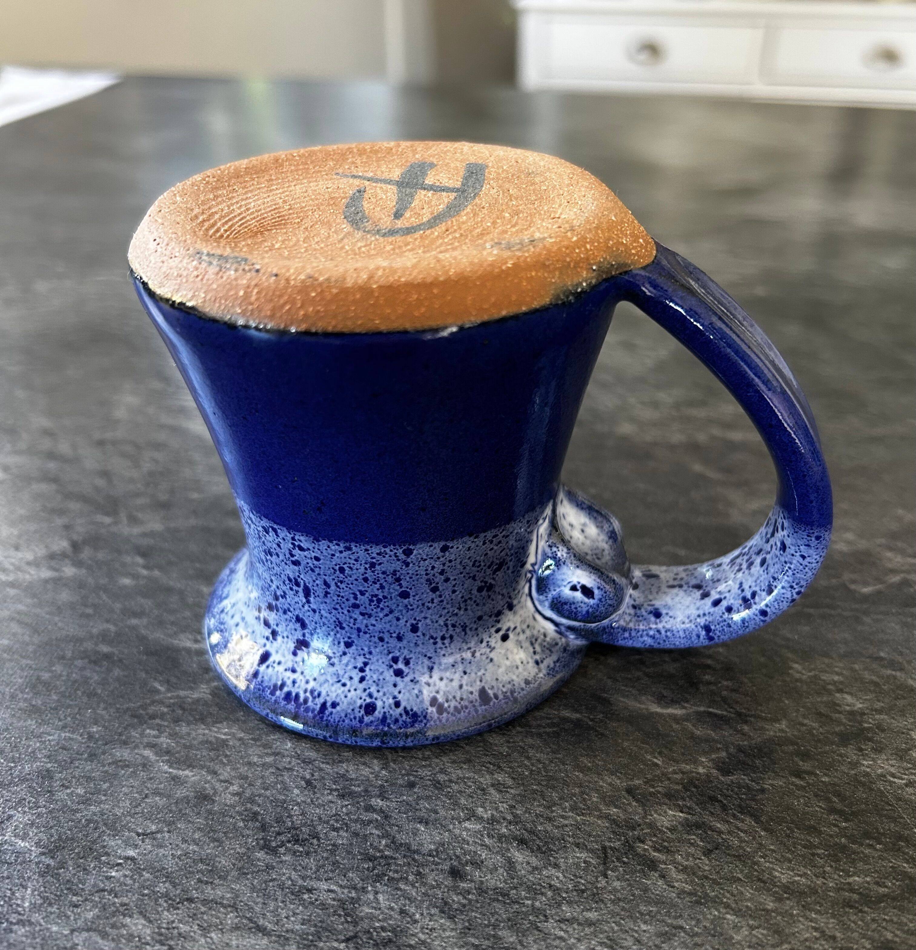 Small enamelled earthenware milk jug