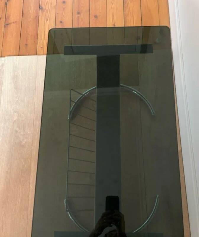 Space Age coffee table in chrome metal and smoked glass with magazine rack – Circa 1970