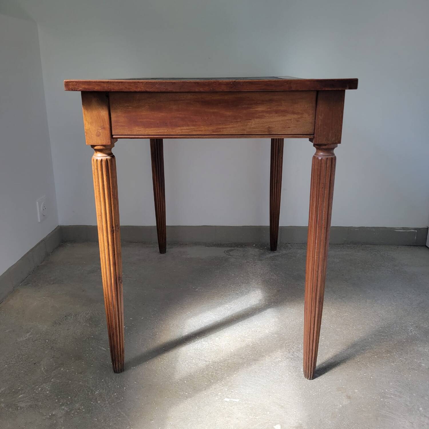 Antique desk made of solid wood and leather.