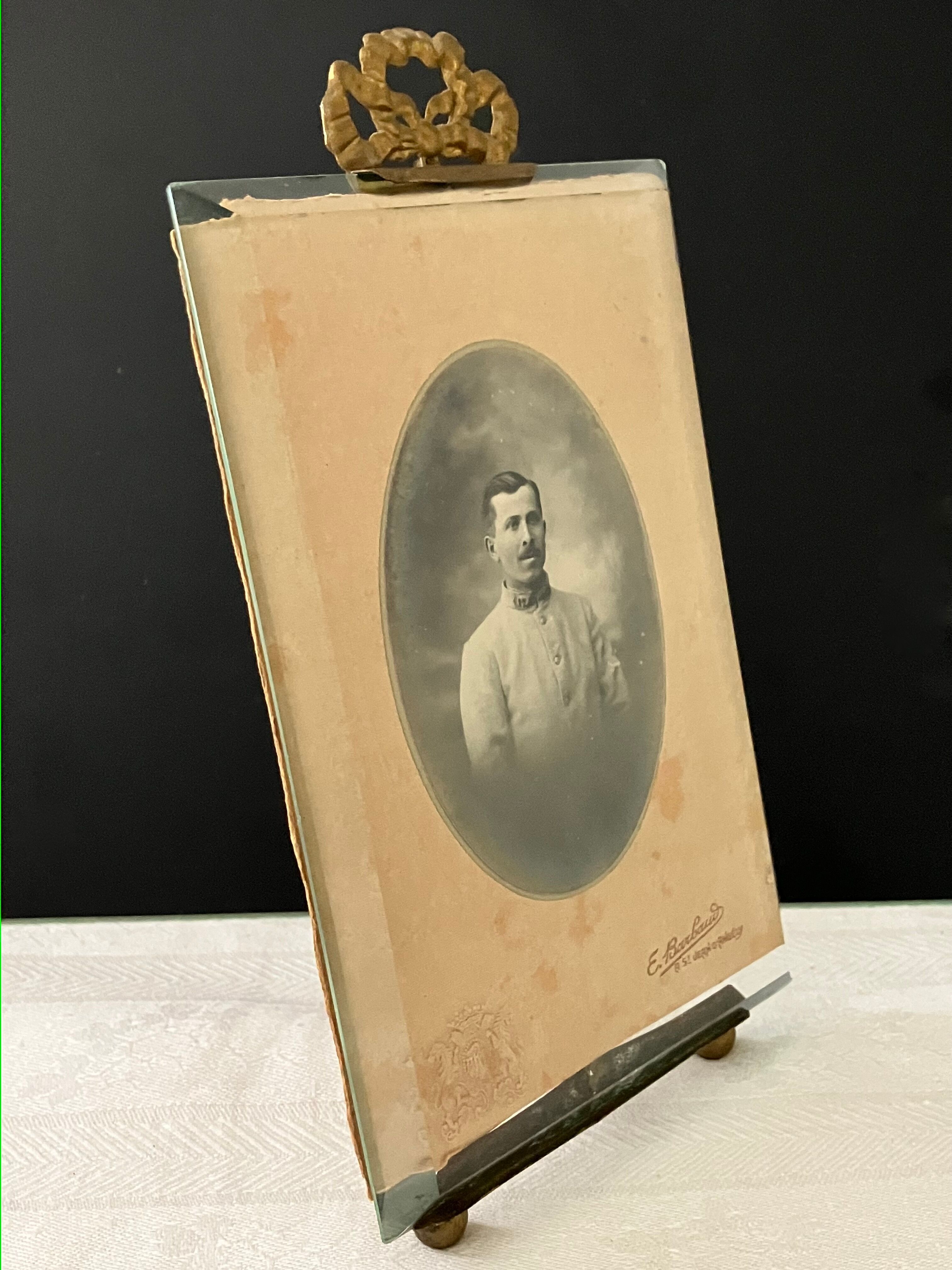 Brass frame, bevelled glass