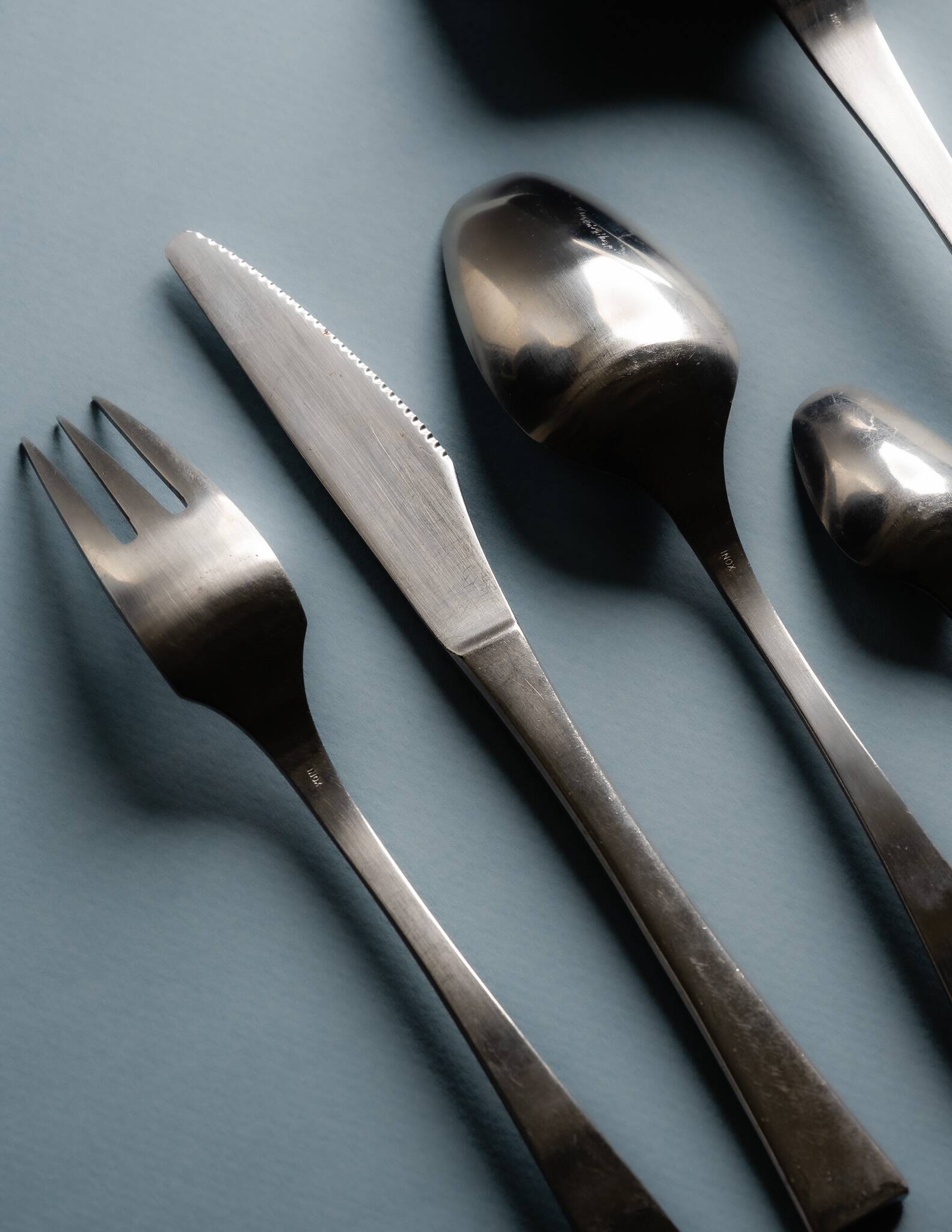 GUY DEGRENNE STAINLESS STEEL CUTLERY SET, 1970s