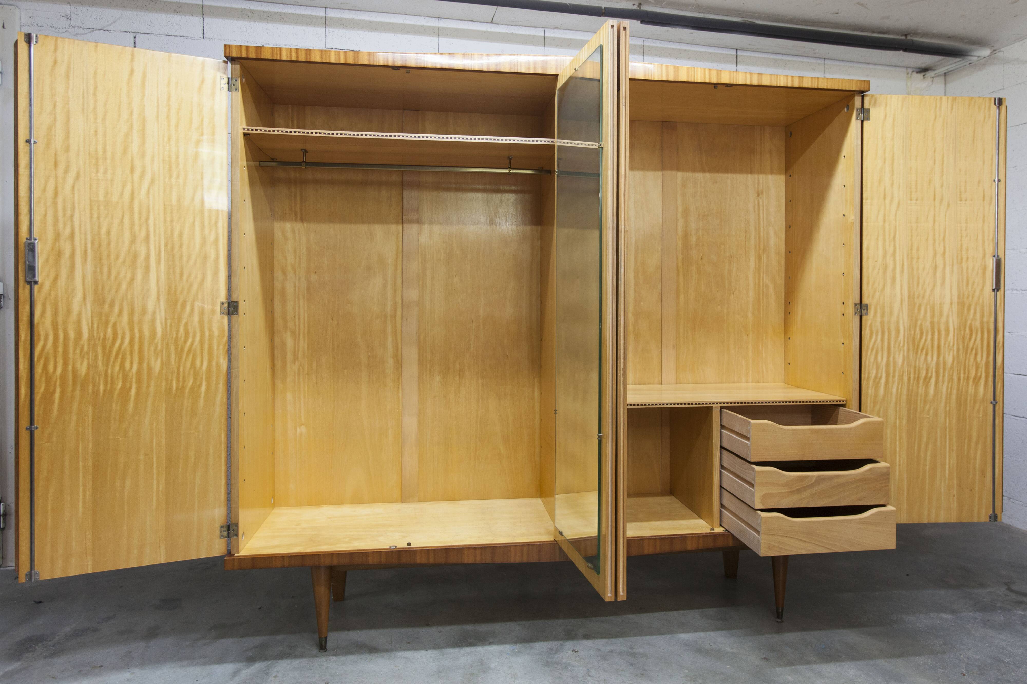 1960s Scandinavian wardrobe, blonde varnished wood, unusual, 4 doors, 3 drawers, 7 shelves.