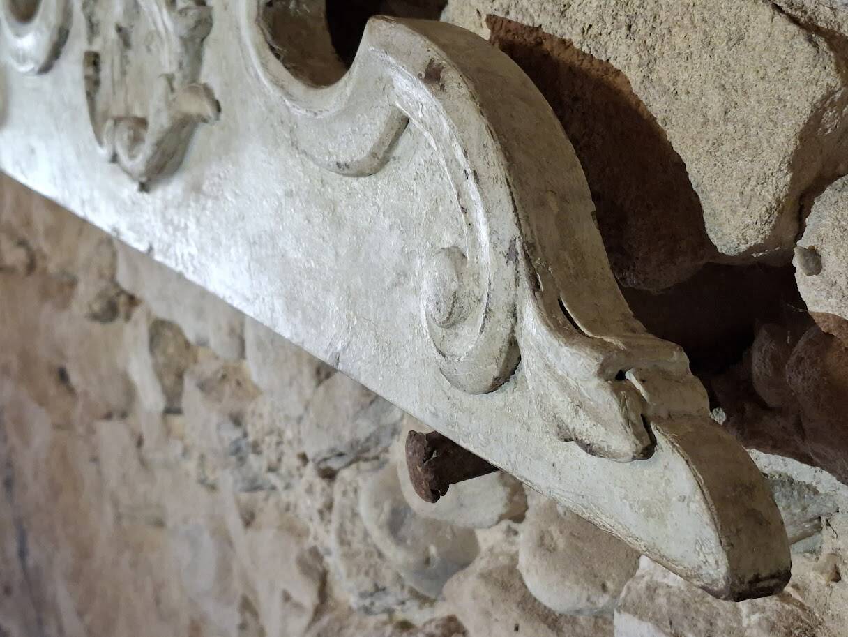 Antique wooden furniture pediment, pale green patina