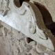 Antique wooden furniture pediment, pale green patina