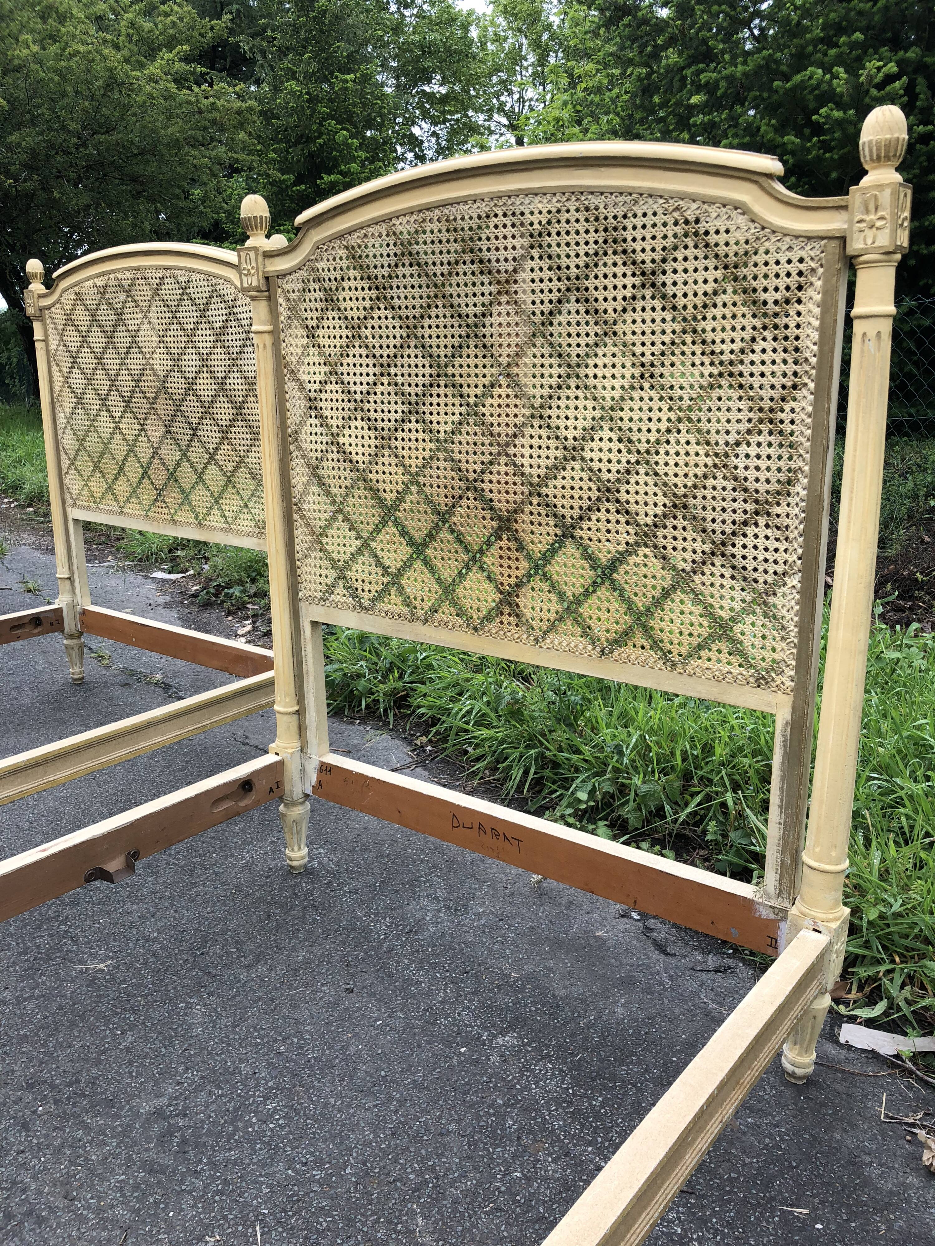 Pair of twin bed Louis XVI caned painted patinated