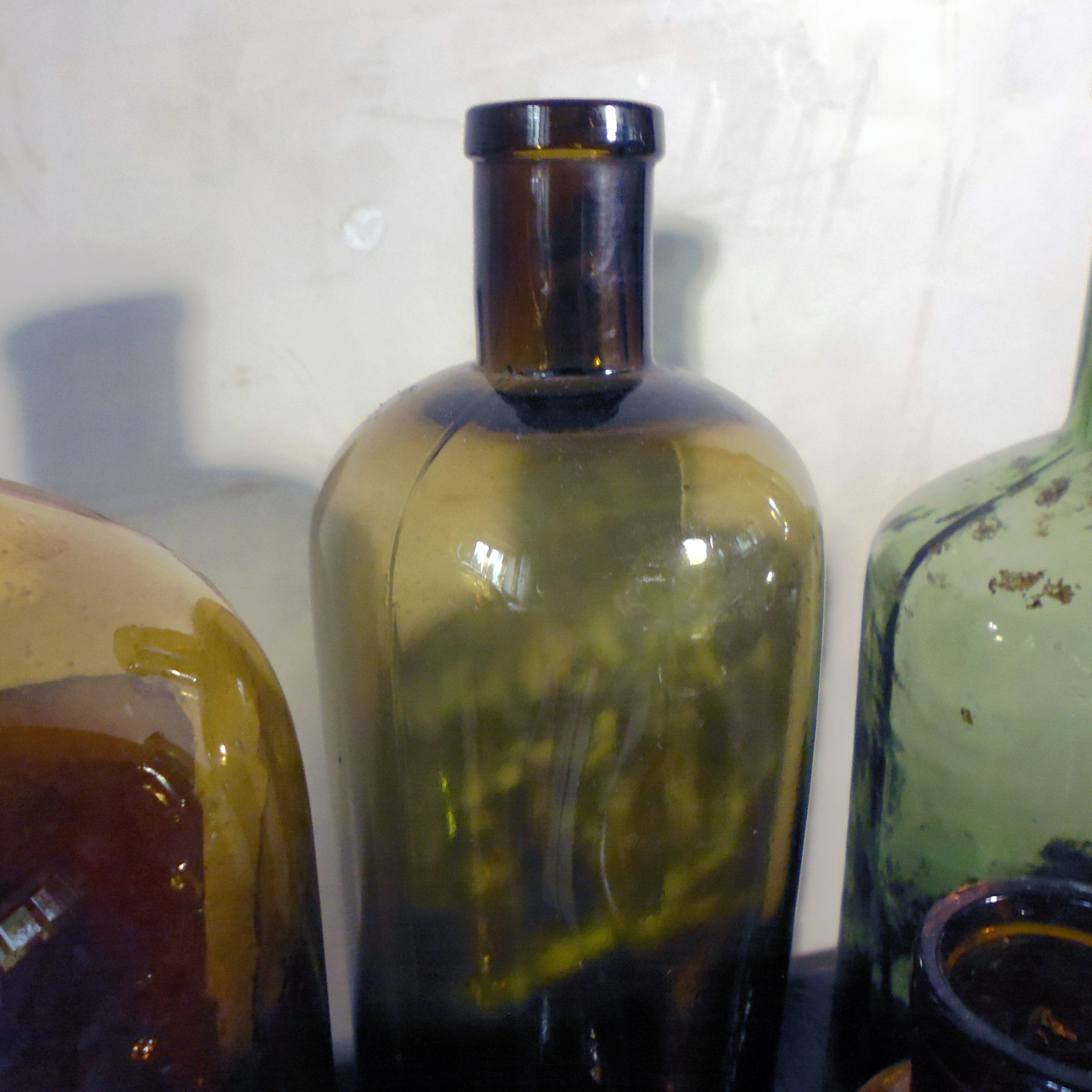 6 bottles of old amber and green pharmacy