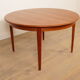 Vintage round dining table | extendable | teak | 125 - 185 cm