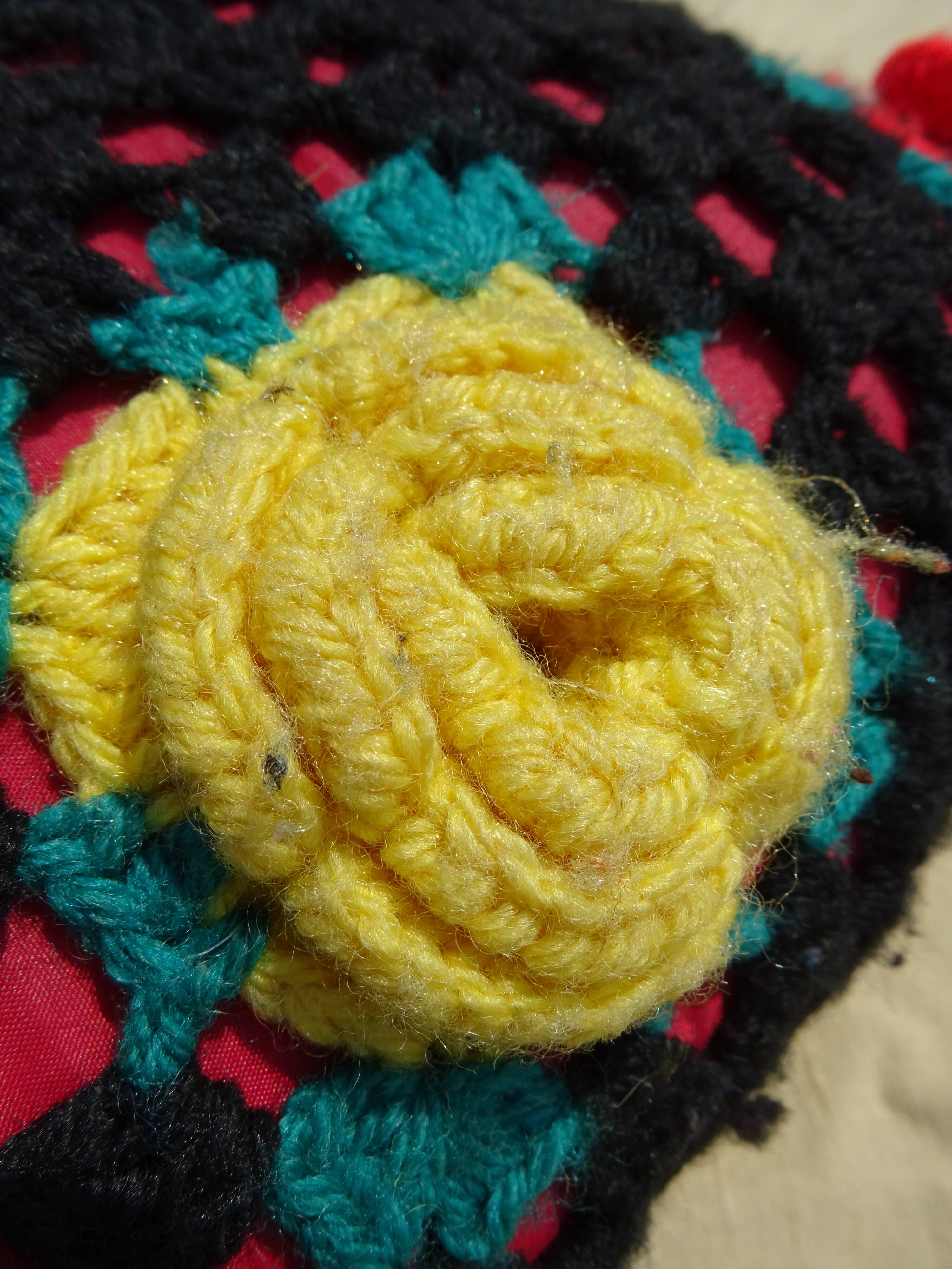 Wool cushion with vintage crochet