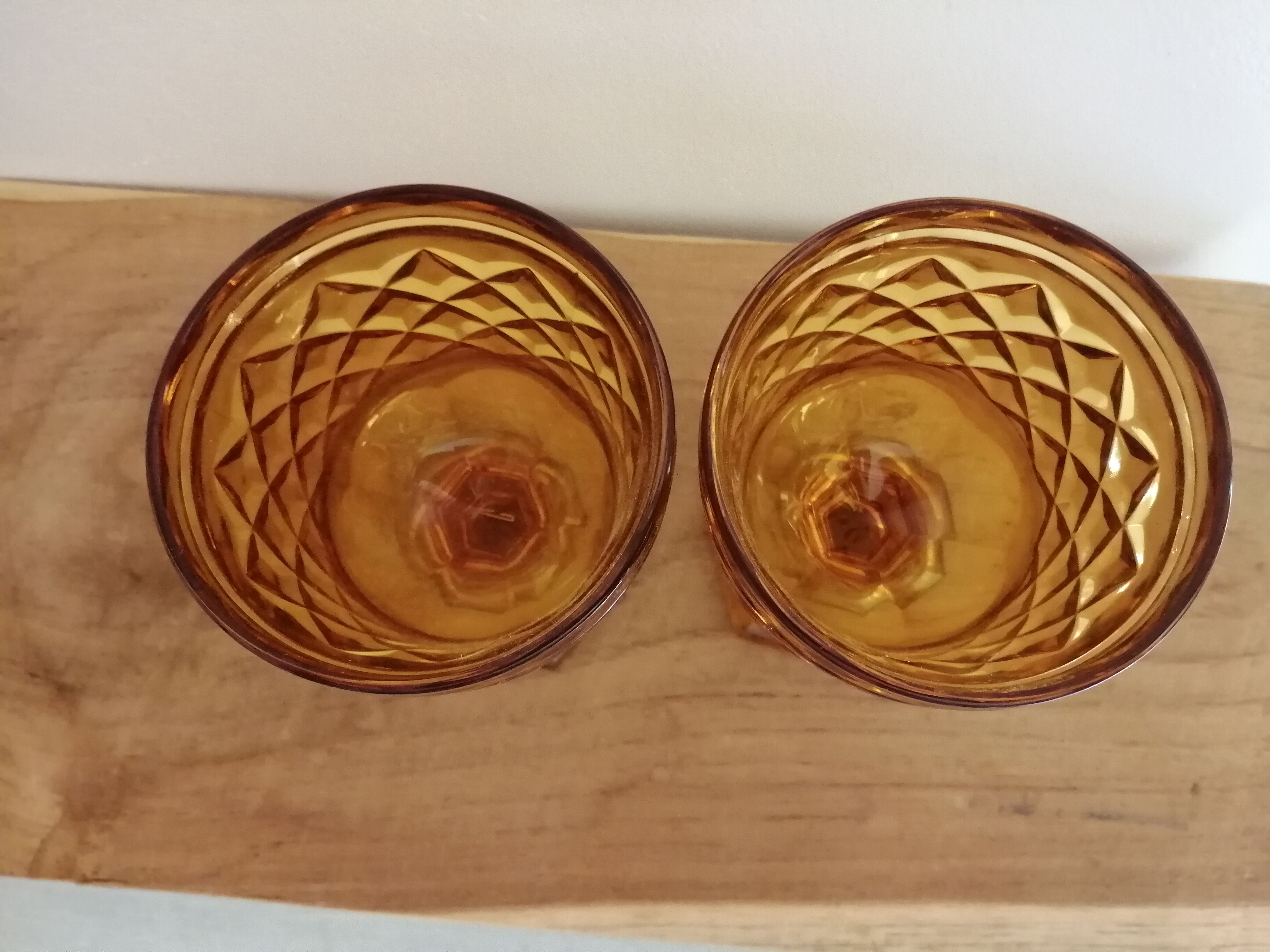 2 vintage amber walking glasses