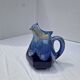 Old flamed ceramic jug. Very beautiful shades of blue, 6 sides.