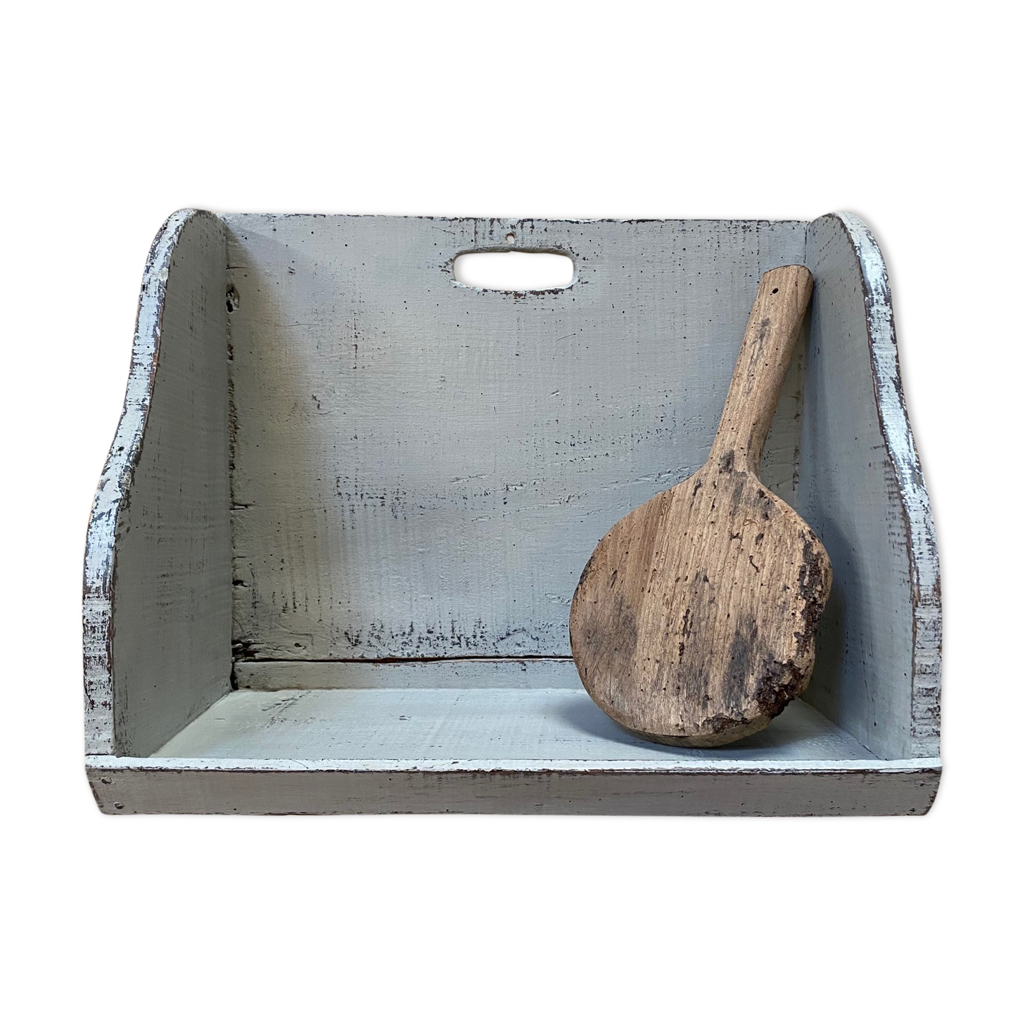 Old patinated washerwoman tray and its beater