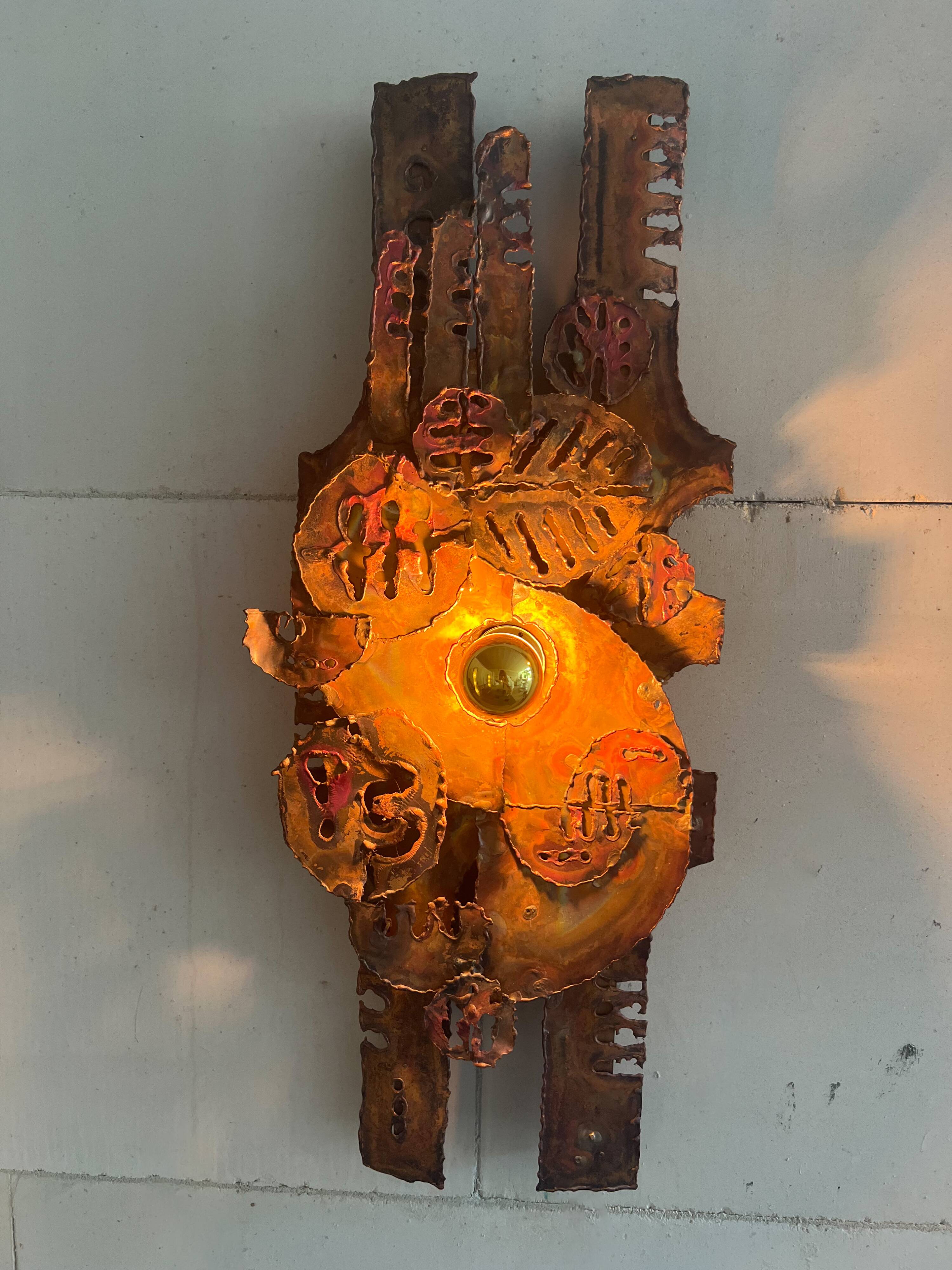 Raw expressive wall sconces by Francesco Pasinato
