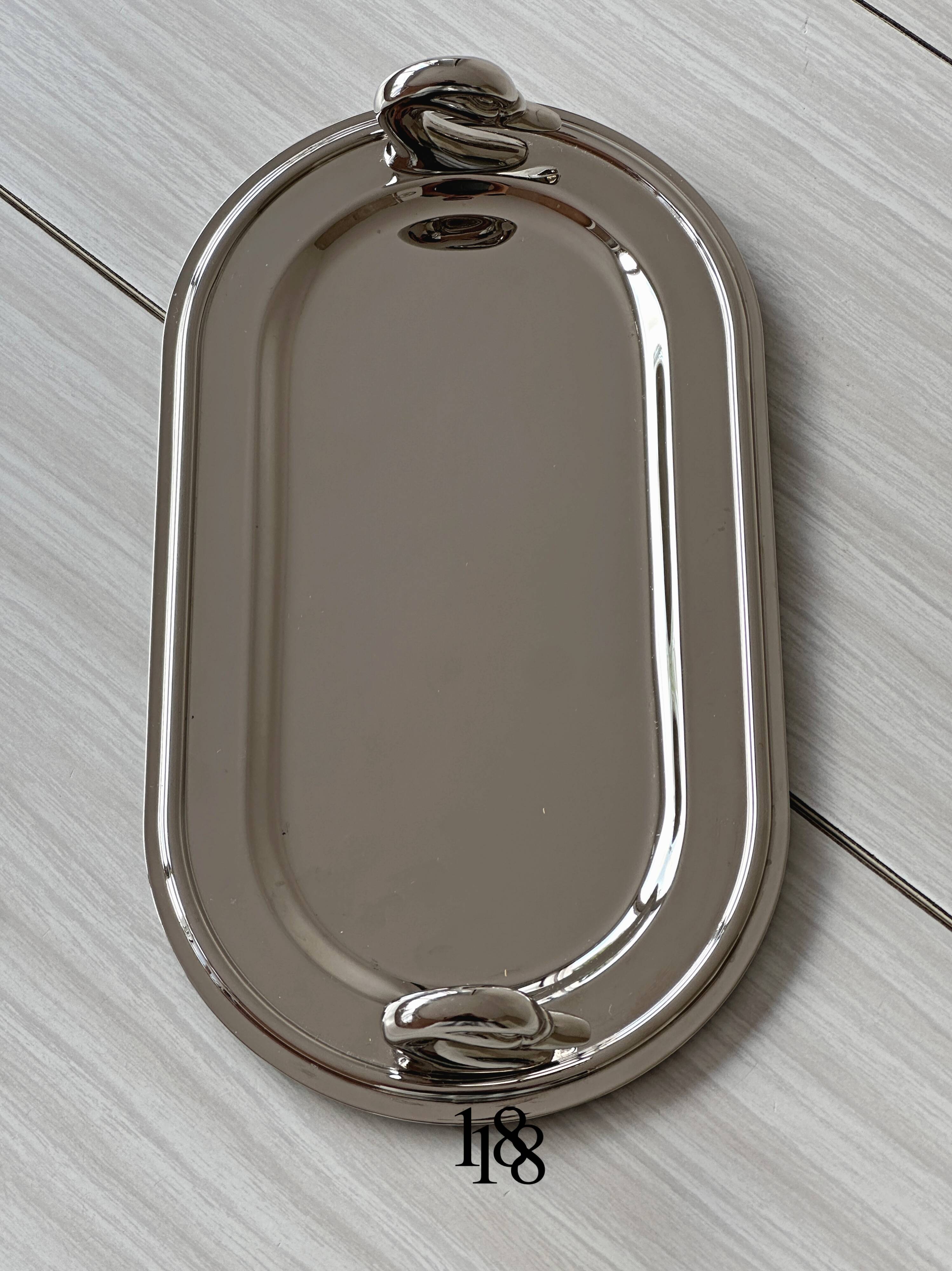 Metal dish with goose head handles serving tray