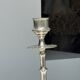 A large silver candlestick holder H23