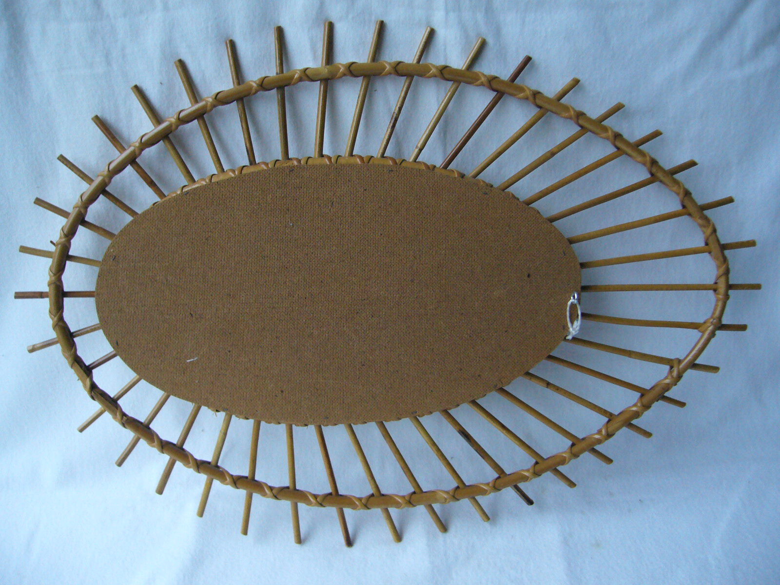 Vintage oval mirror in rattan