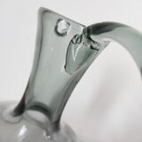 Engraved glass pitcher