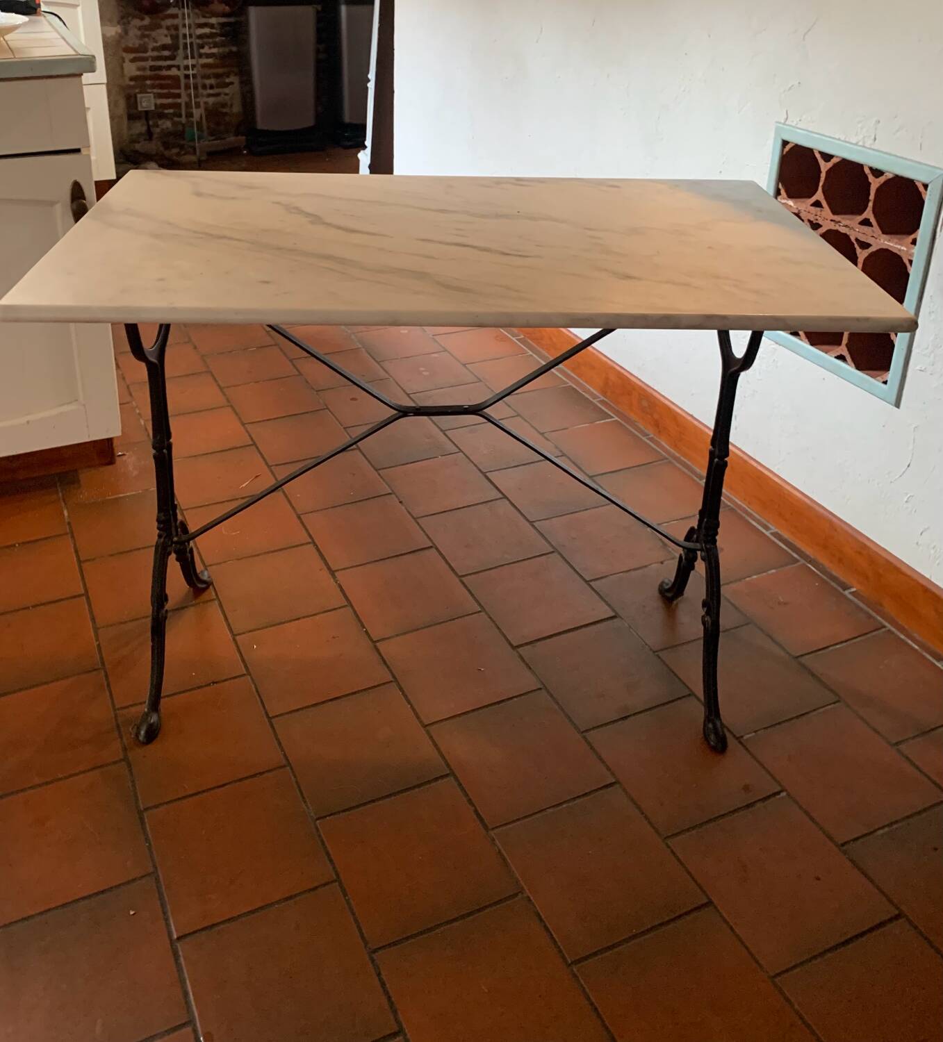 Marble and wrought iron bistro table