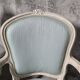 Pair of Louis XV style armchairs in patinated wood, light blue fabric.